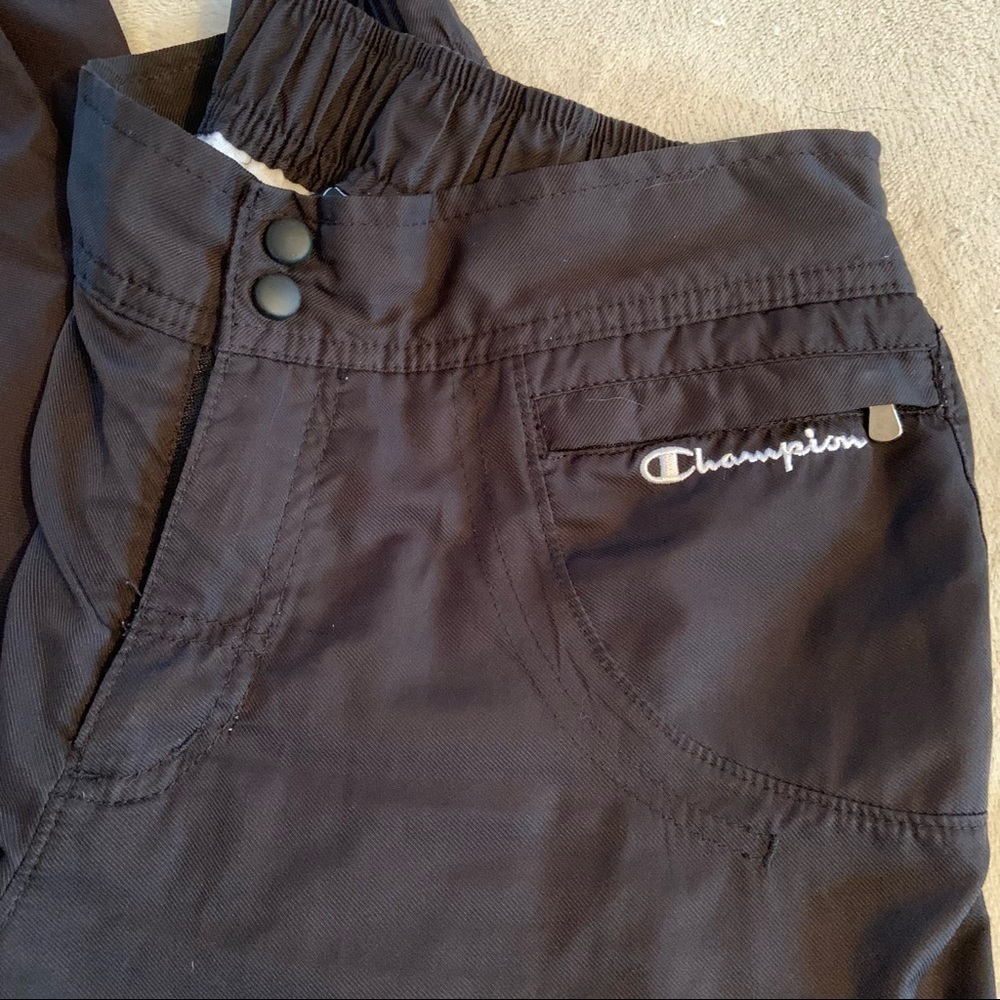 CHAMPION black lined track pants size medium